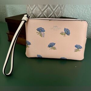 Coach Pink Leather Wristlet with Blue Floral Print